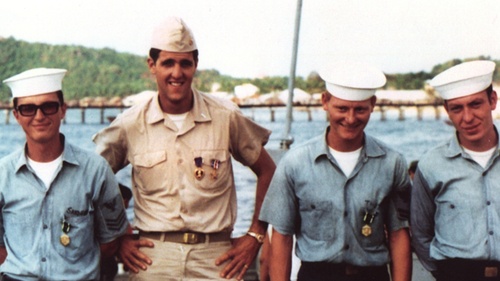 Vietnam, on February 28, 1969, after a medal presentation for Silver Star action. From left: Del Sandusky, John Kerry, Gene Thorson, Thomas Belodeau. Kneeling from left, Mike Medeiros, Fred Short.