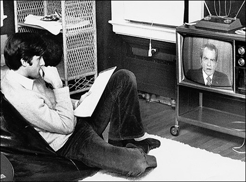 John Kerry watches President Richard Nixon announce the cease-fire in Vietnam on January 24 1973.