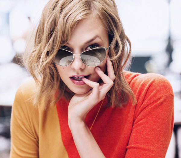 In 2014, she designed her own eyewear line, Karlie Kloss x Warby Parker, became the new face of LOreal Paris, and she covered the March 2015 issue of Vogue along with her best friend Taylor Swift.