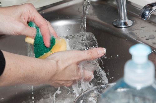 woman-washing-dishes-in-sink-8891-142116