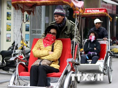 Du khách thăm quan phố cổ Hà Nội. Ảnh minh họa. (Nguồn: Nhật Anh/TTXVN)