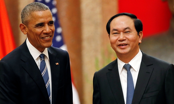 Chủ tịch nước Trần Đại Quang (phải) và Tổng thống Mỹ Barack Obama. Ảnh: Reuters.