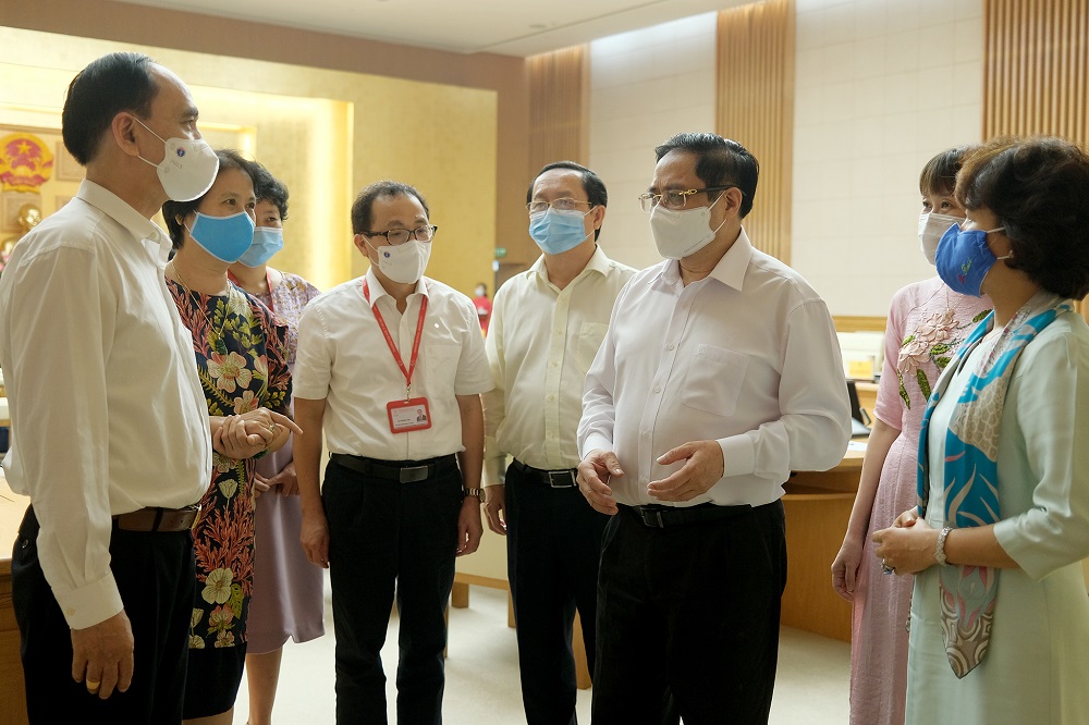Diễn biến dịch ngày 13/6: Huy động nguồn lực cho nghiên cứu, sản xuất vắc xin phòng COVID-19 trong nước - Ảnh 1.
