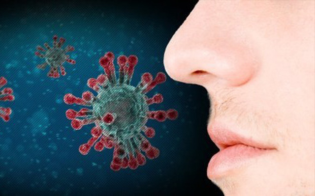 COVID-19 có thể gây ra những bất thường ở vùng miệng - Ảnh 2.