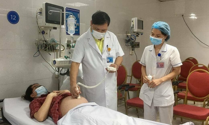 Gần 200 phụ nữ mang thai trên 13 tuần ở Hà Nội tiêm vaccine COVID-19 - Ảnh 3.