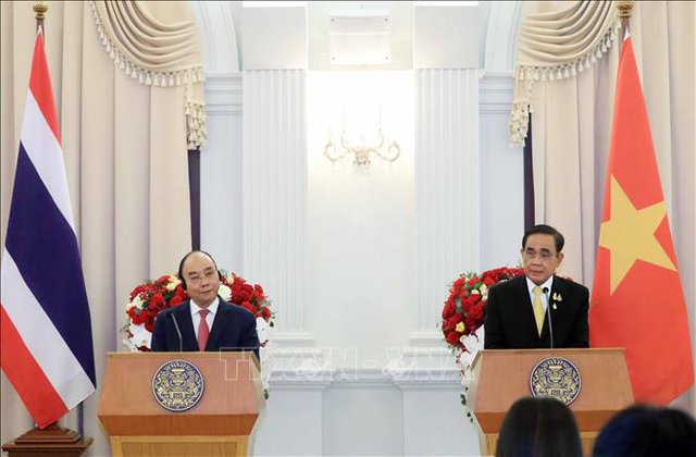 Chủ tịch nước Nguyễn Xuân Phúc và Thủ tướng Thái Lan Prayuth Chan-o-cha đồng chủ trì họp báo - Ảnh 1.