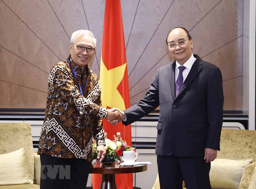Hình ảnh hoạt động của Chủ tịch nước Nguyễn Xuân Phúc tại Indonesia - Ảnh 4.
