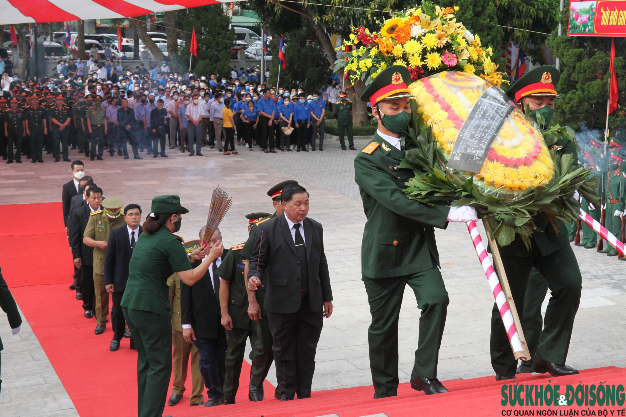 An táng 103 hài cốt liệt sĩ quân tình nguyện, chuyên gia Việt Nam hy sinh ở Lào   - Ảnh 9.