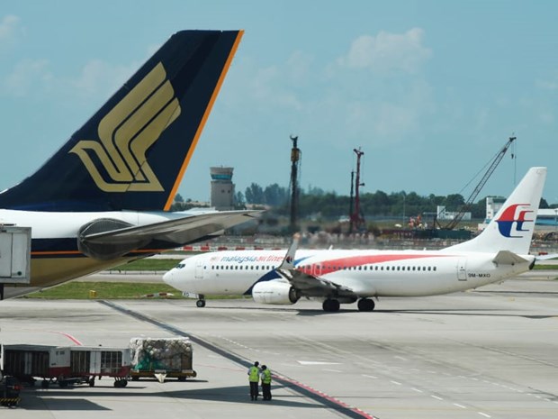 Malaysia khai thác chuyến bay chở khách đầu tiên dùng nhiên liệu xanh  - Ảnh 1.
