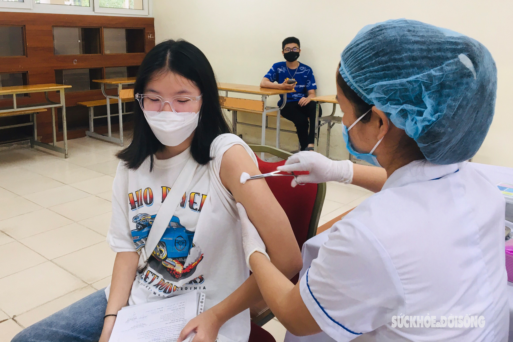 Y tế quận Ba Đình tổ chức tiêm vaccine COVID-19 mũi 3 cho trẻ từ 12 đến 17 tuổi - Ảnh 9.