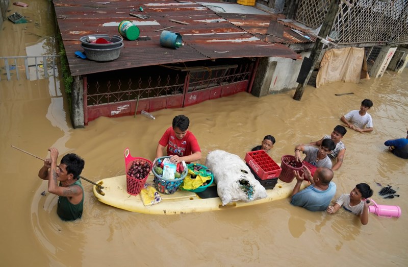 Philippines tan hoang sau siêu bão Noru - Ảnh 11.