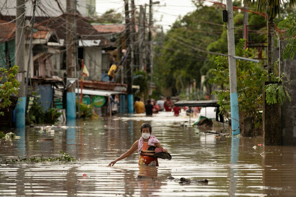 Philippines tan hoang sau siêu bão Noru - Ảnh 14.