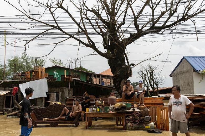 Philippines tan hoang sau siêu bão Noru - Ảnh 16.