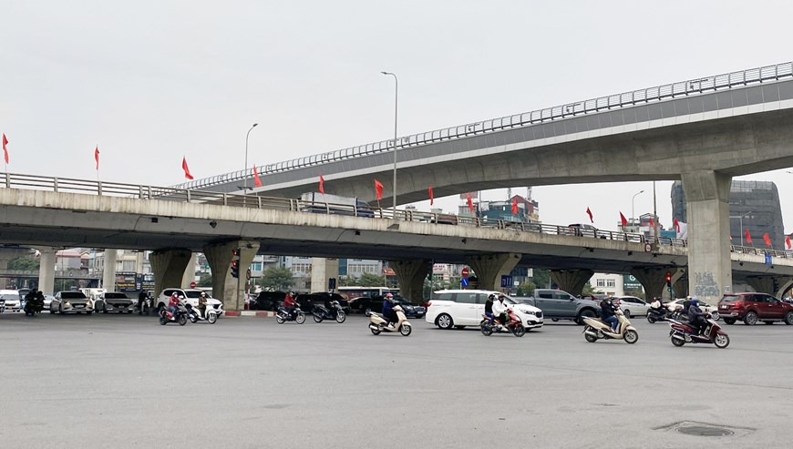 [Photo] Cửa ngõ Thủ đô thông thoáng đầu giờ chiều ngày 28 Tết - Ảnh 15.