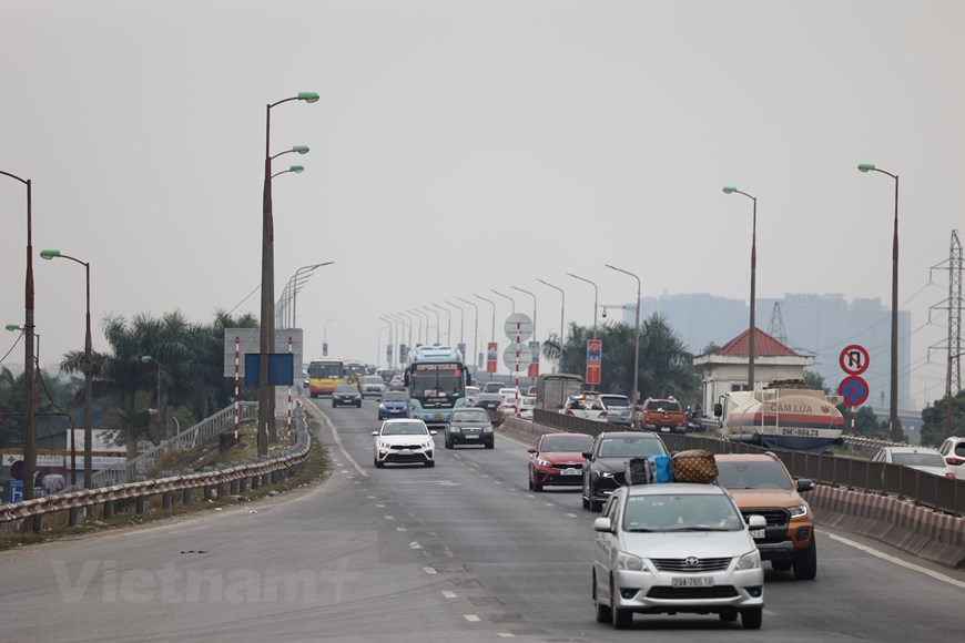 [Photo] Cửa ngõ Thủ đô thông thoáng đầu giờ chiều ngày 28 Tết - Ảnh 3.