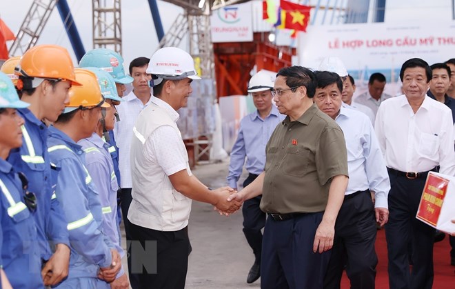 Thủ tướng Phạm Minh Chính dự Lễ hợp long cầu Mỹ Thuận 2 - Ảnh 8. Thủ tướng Phạm Minh Chính dự Lễ hợp long cầu Mỹ Thuận 2 - Ảnh 8.