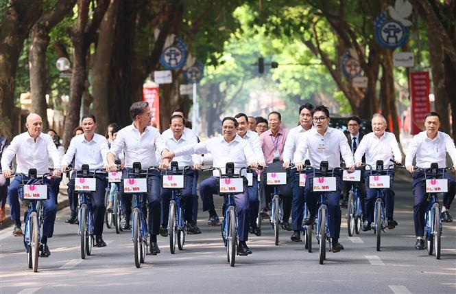 Thủ tướng Phạm Minh Chính và Thủ tướng Hà Lan cùng đạp xe dạo phố Hà Nội - Ảnh 4.