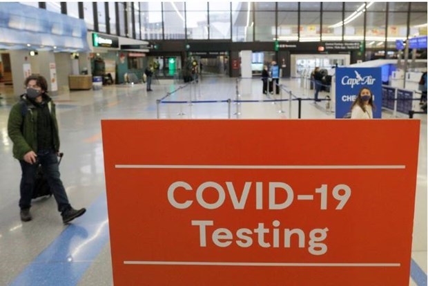 Trung Quốc ngừng yêu cầu kết quả xét nghiệm COVID-19 với du khách - Ảnh 1.