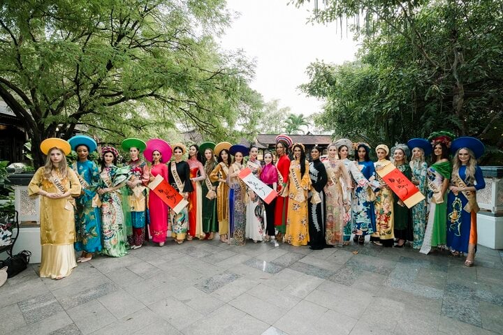 80 thí sinh Miss Global 2023 diện áo dài, trải nghiệm văn hóa Việt Nam- Ảnh 2.