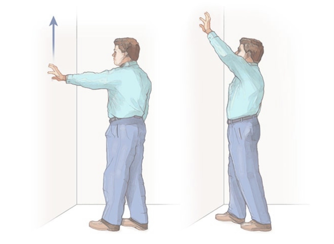 A person in blue pants holding his hands up  Description automatically generated