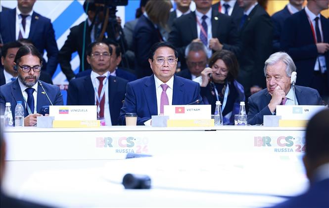 Thủ tướng Phạm Minh Chính phát biểu tại Hội nghị các nhà lãnh đạo BRICS mở rộng- Ảnh 1.