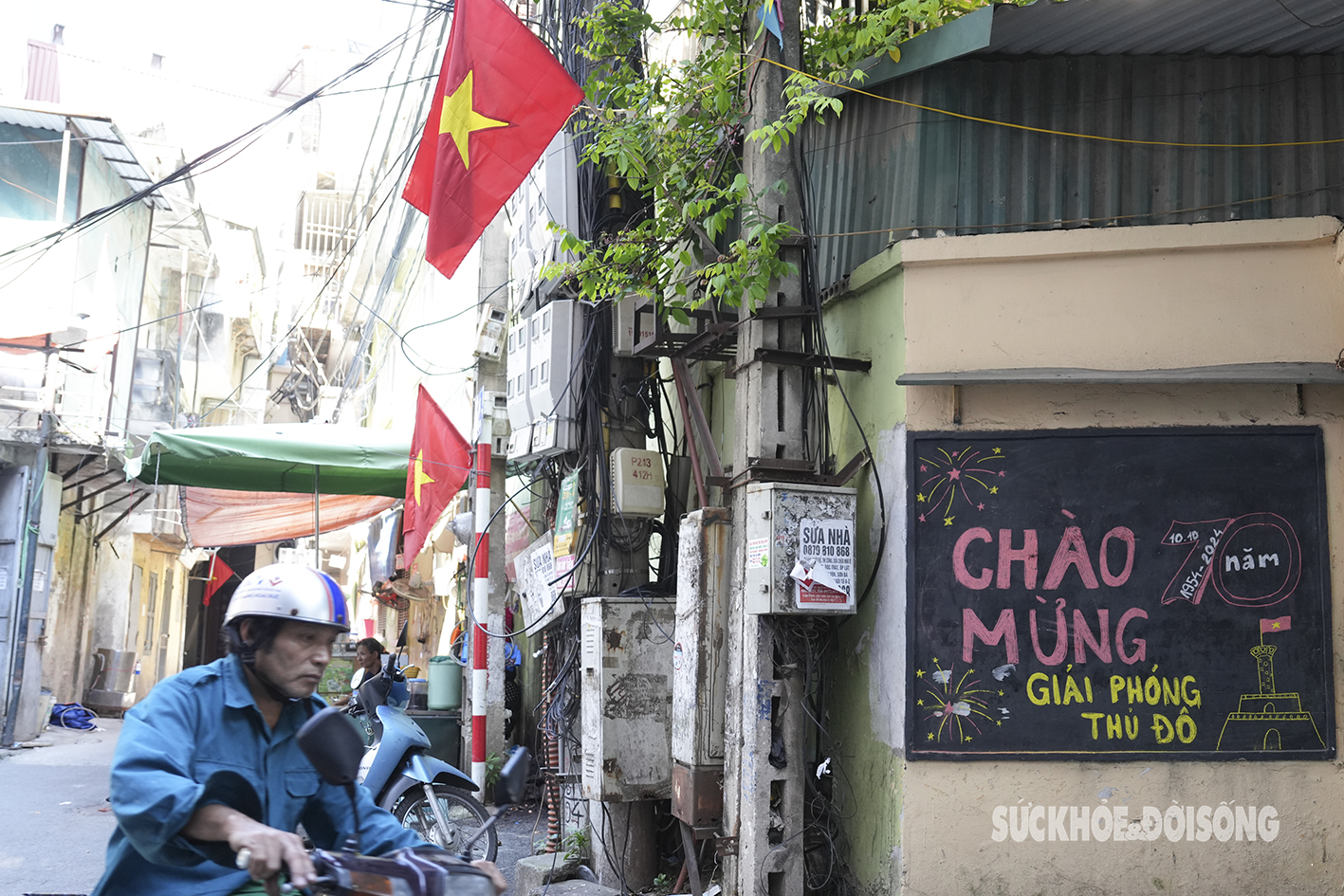 Hà Nội: Bảng tin tường ‘thay áo mới’ bằng tranh cổ động phấn màu- Ảnh 9.