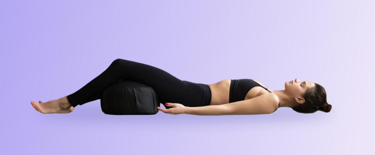 corpse-pose__yoga-poses-with-a-bolster