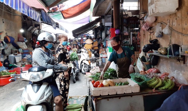 Đảm bảo an toàn thực phẩm tại các chợ dân sinh cần đồng bộ các giải pháp- Ảnh 1.