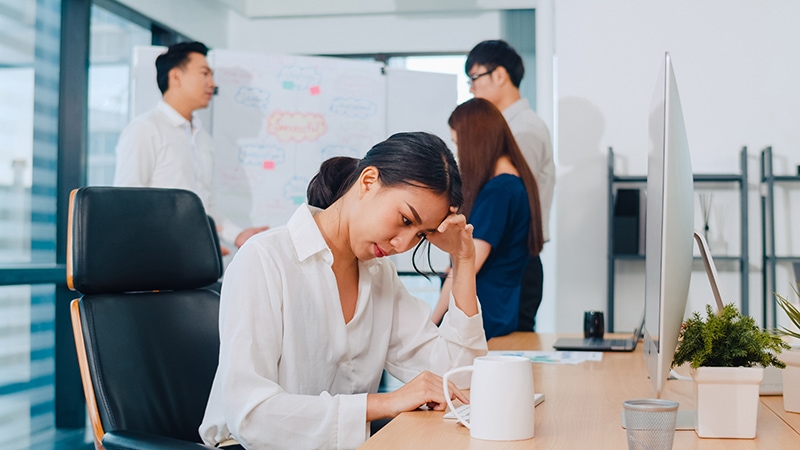 millennial-young-chinese-businesswoman-working-stress-out-with-project-research-problem-computer-desktop-meeting-room-small-modern-office-asia-people-occupational-burnout-syndrome-concept