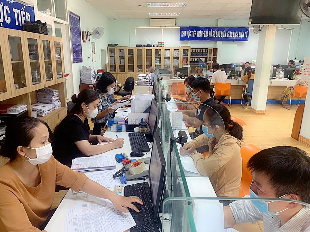 BHXH Việt Nam tập trung nguồn lực đáp ứng đầy đủ, kịp thời quyền lợi người tham gia BHXH, BHYT- Ảnh 1.