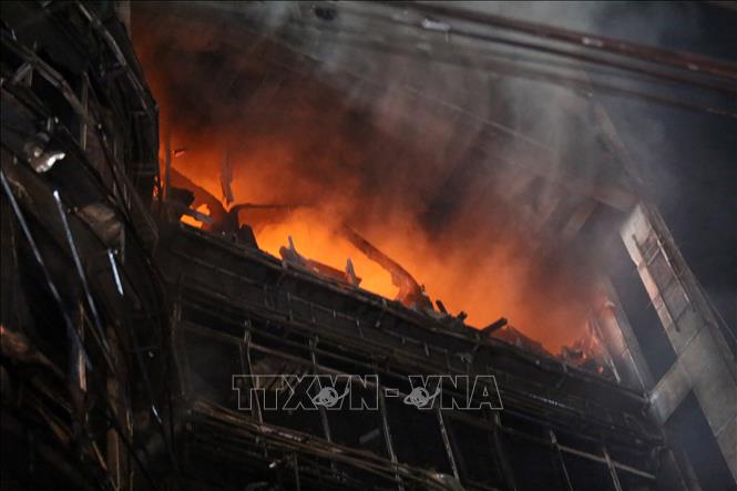 Xác định nguyên nhân vụ cháy làm 46 người chết ở Bangladesh- Ảnh 1.
