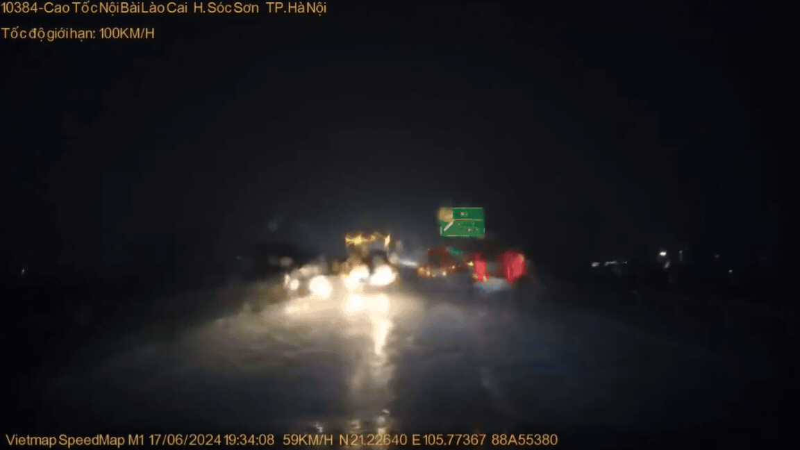 Video: Xe tải ngang nhiên chạy ngược chiều trên cao tốc giữa mưa lớn- Ảnh 2.