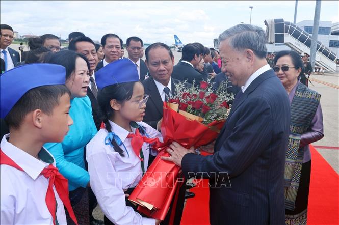 Chủ tịch nước kết thúc tốt đẹp chuyến thăm cấp Nhà nước tới CHDCND Lào- Ảnh 2.