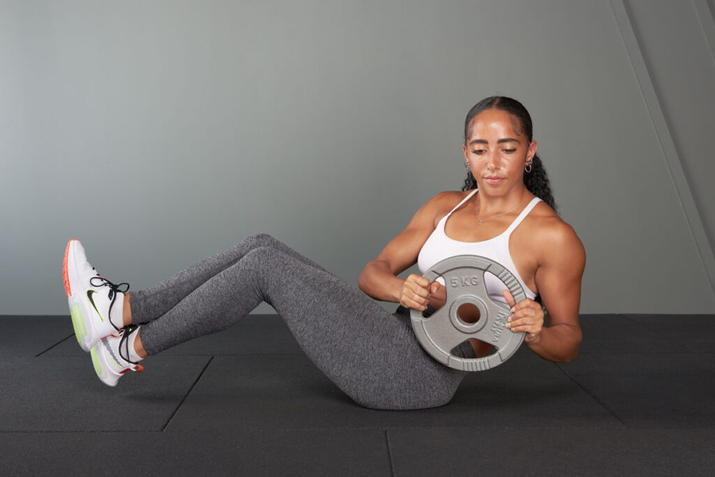 11 Weight Plate Exercises For A Solid Core | Mirafit