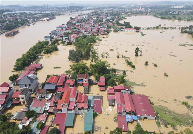 Bắc Ninh: Hơn 700 hộ dân xã Tiên Lục vẫn bị cô lập do mưa lũ- Ảnh 1.