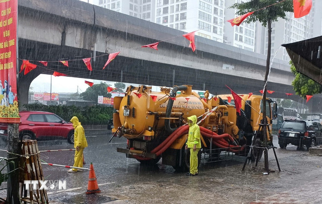 Hà Nội kích hoạt các biện pháp tiêu thoát nước, phòng chống úng ngập- Ảnh 2.