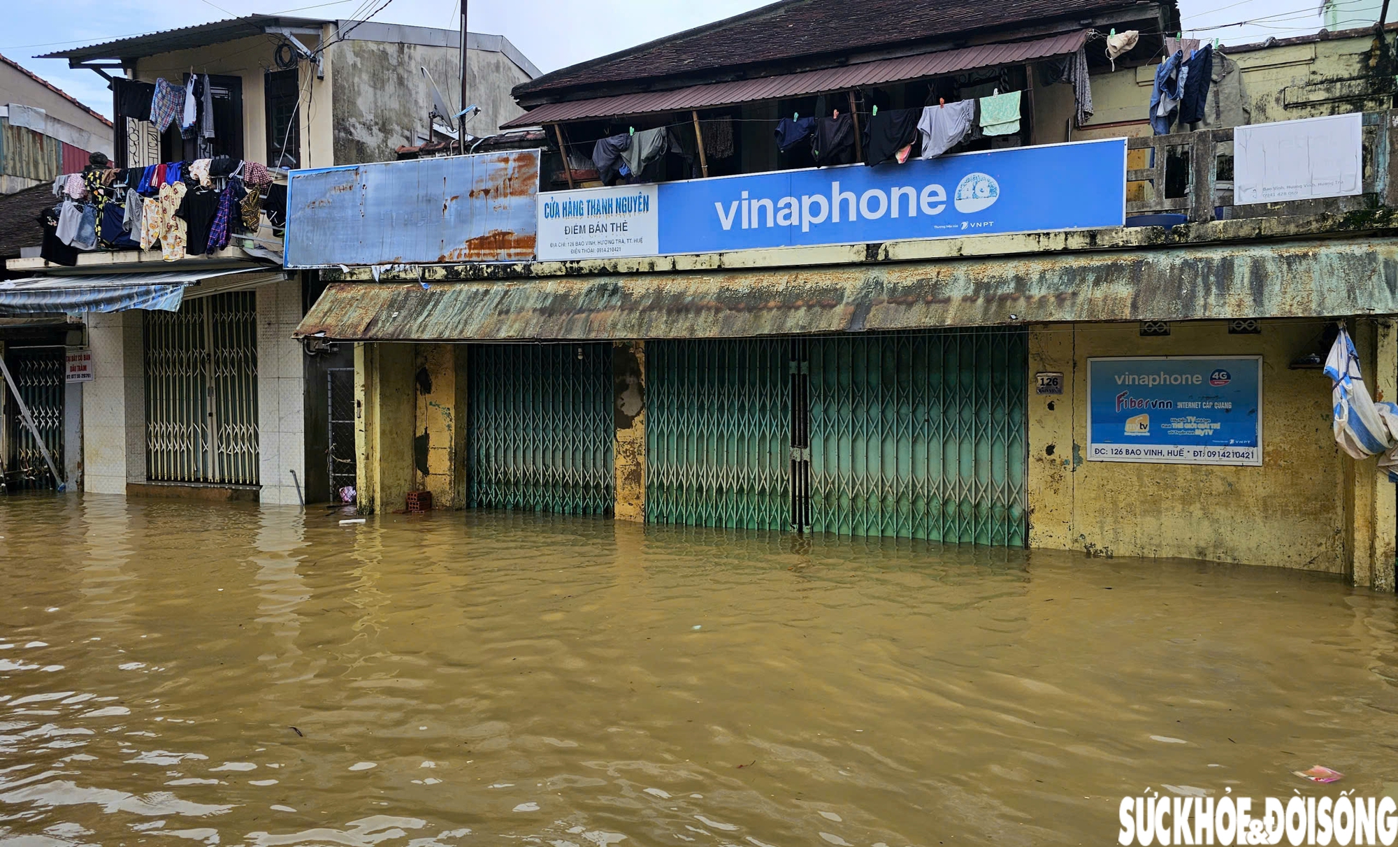 Người dân phố cổ Bao Vinh gượng dậy sau lũ lịch sử- Ảnh 1.