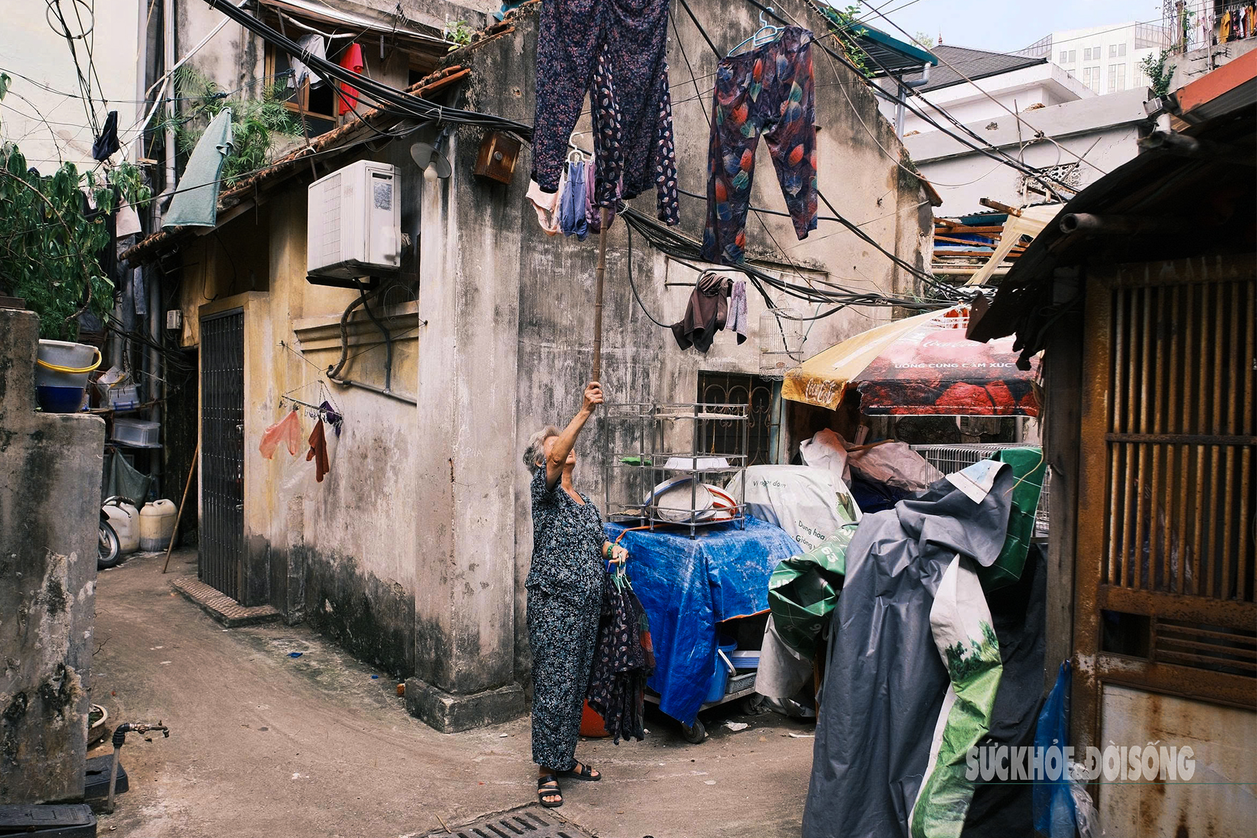 Các hộ dân sống ở ngõ nhỏ trên đất vàng hồ Gươm trước ngày di dời- Ảnh 4. Các hộ dân sống ở ngõ nhỏ trên đất vàng hồ Gươm trước ngày di dời- Ảnh 4.