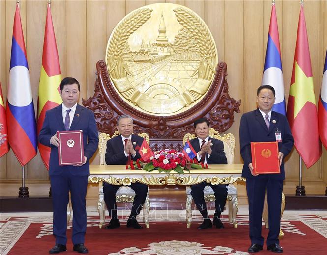 Tổng Bí thư Tô Lâm và Tổng Bí thư, Chủ tịch nước Lào chứng kiến Lễ trao các văn kiện hợp tác- Ảnh 4. Tổng Bí thư Tô Lâm và Tổng Bí thư, Chủ tịch nước Lào chứng kiến Lễ trao các văn kiện hợp tác- Ảnh 4.