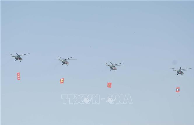 Kỷ niệm trọng thể 50 năm Quốc khánh nước Cộng hòa Dân chủ Nhân dân Lào- Ảnh 6. Kỷ niệm trọng thể 50 năm Quốc khánh nước Cộng hòa Dân chủ Nhân dân Lào- Ảnh 6.