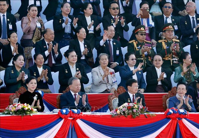 Kỷ niệm trọng thể 50 năm Quốc khánh nước Cộng hòa Dân chủ Nhân dân Lào- Ảnh 3. Kỷ niệm trọng thể 50 năm Quốc khánh nước Cộng hòa Dân chủ Nhân dân Lào- Ảnh 3.