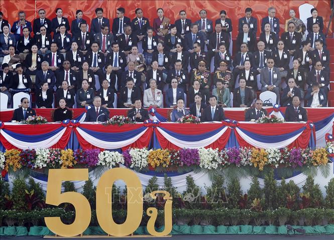 Kỷ niệm trọng thể 50 năm Quốc khánh nước Cộng hòa Dân chủ Nhân dân Lào- Ảnh 1. Kỷ niệm trọng thể 50 năm Quốc khánh nước Cộng hòa Dân chủ Nhân dân Lào- Ảnh 1.