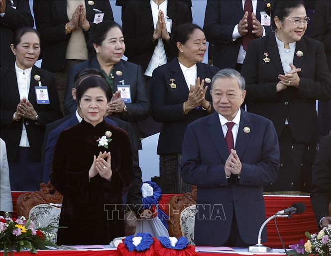 Kỷ niệm trọng thể 50 năm Quốc khánh nước Cộng hòa Dân chủ Nhân dân Lào- Ảnh 2. Kỷ niệm trọng thể 50 năm Quốc khánh nước Cộng hòa Dân chủ Nhân dân Lào- Ảnh 2.