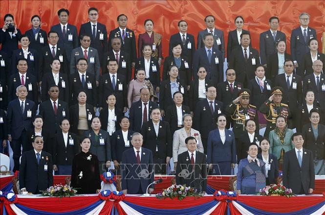 Tổng Bí thư Tô Lâm và Phu nhân dự Lễ kỷ niệm 50 năm Quốc khánh Lào- Ảnh 1. Tổng Bí thư Tô Lâm và Phu nhân dự Lễ kỷ niệm 50 năm Quốc khánh Lào- Ảnh 1.