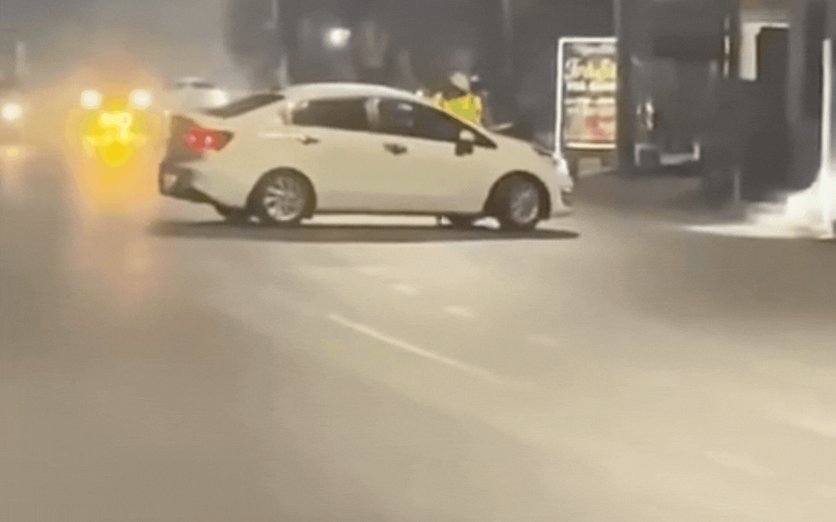 Tài xế có cồn lái ô tô hất văng CSGT lên ca-pô, phóng xe bỏ chạy - Ảnh 2.