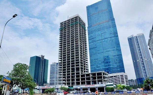 Hôm nay xét xử loạt cựu lãnh đạo VICEM liên quan tòa nhà nghìn tỷ 'đắp chiếu' 10 năm- Ảnh 1.