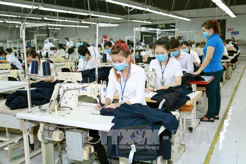 Mức lương tối thiểu vùng thay đổi ra sao khi sắp xếp lại đơn vị hành chính?- Ảnh 1.