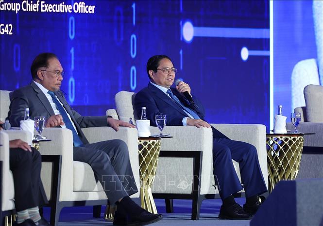 Thủ tướng dự Phiên thảo luận 'Lưới thông minh kết nối thông qua hợp tác tự chủ AI'- Ảnh 4. Thủ tướng dự Phiên thảo luận 'Lưới thông minh kết nối thông qua hợp tác tự chủ AI'- Ảnh 4.