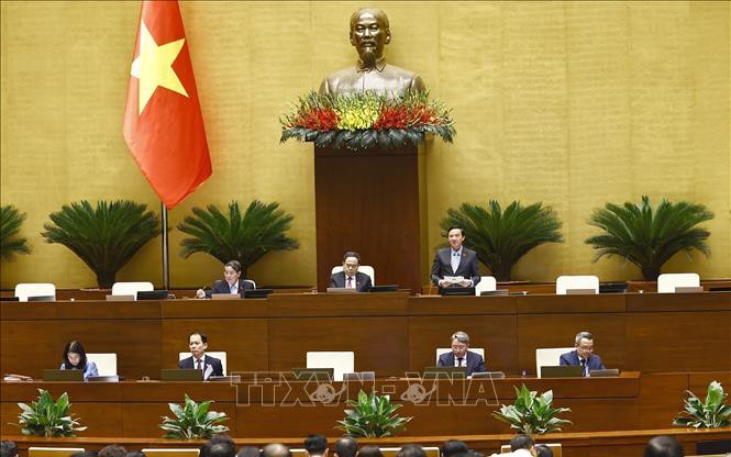ĐBQH đề xuất một số chính sách khi sắp xếp đơn vị hành chính cấp tỉnh- Ảnh 4. Ngày 12/6, Quốc hội biểu quyết thông qua Nghị quyết về việc sắp xếp đơn vị hành chính cấp tỉnh năm 2025