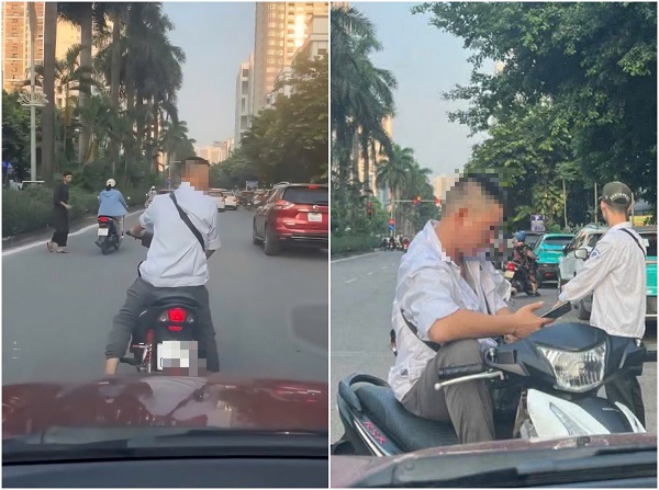 Xôn xao clip người đàn ông ngang nhiên chặn đường, đòi tiền đỗ xe ở Hà Nội- Ảnh 1. Xôn xao clip người đàn ông ngang nhiên chặn đường, đòi tiền đỗ xe ở Hà Nội- Ảnh 1.